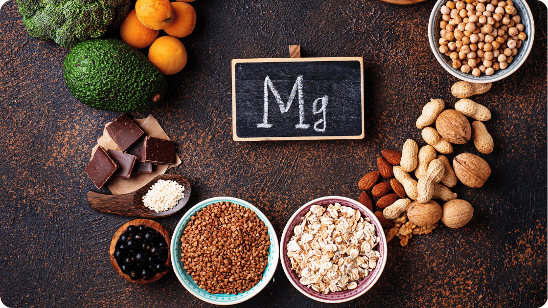 Mg sign surrounded by food in bowls 